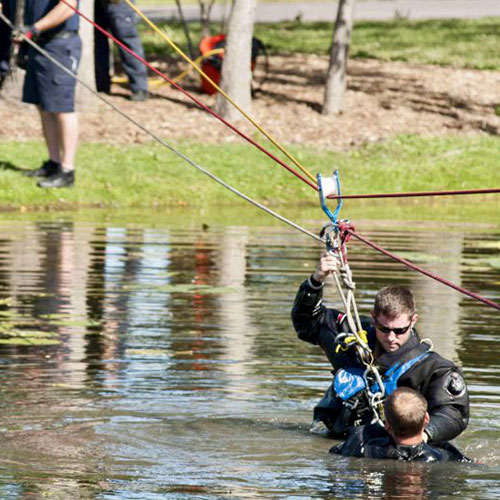 115th Fighter Wing Airman Workman participating in a water rescue drill